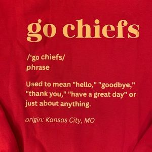 Red “Go Chiefs” sweatshirt.